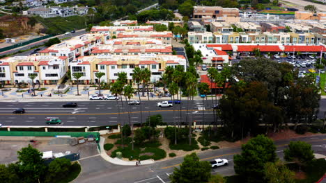 aerial view of a suburban community with residential and commercial buildings