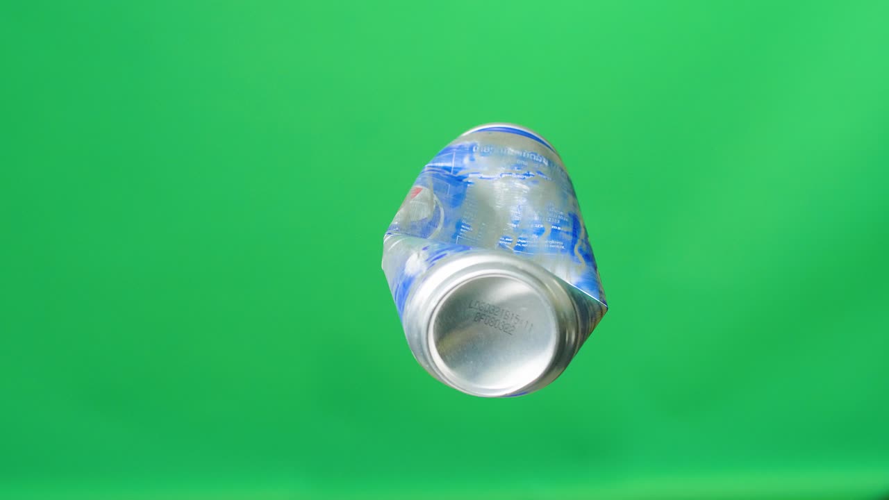 Compressed Can Rotating On Green Screen Background