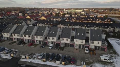 aerial view of small european city with modern residential suburb neighborhood