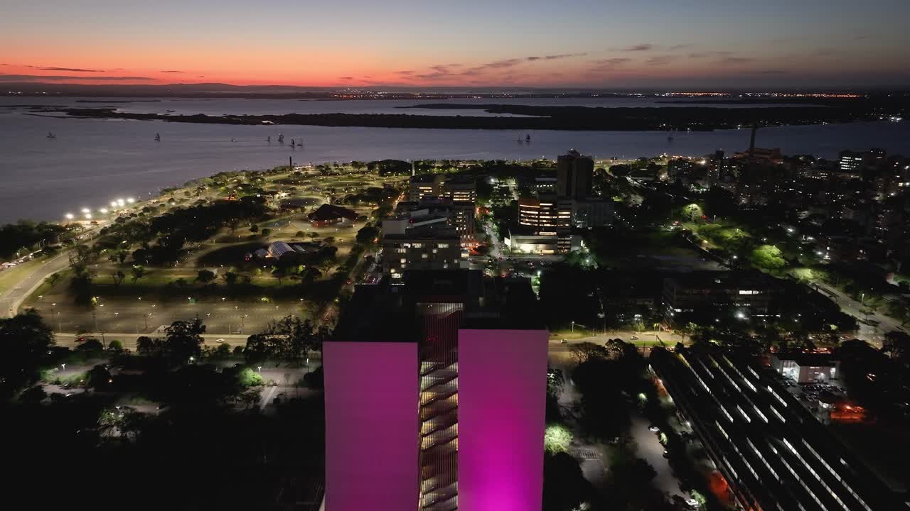 Government Building At Porto Alegre In Rio Grande Do Sul Brazil. Illuminated City. Sunset Downtown. Colored Cityscape. Government Building At Porto Alegre In Rio Grande Do Sul Brazil.