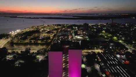 government building at porto alegre in rio grande do sul brazil. illuminated city. sunset downtown. colored cityscape. government building at porto alegre in rio grande do sul brazil.