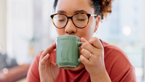 smile, coffee and laptop with black woman in home