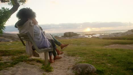 Couple-embracing-each-other-on-the-beach-4k