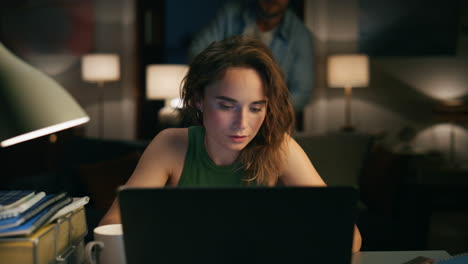 thoughtful freelancer noticing table remotely closeup. girl watching laptop