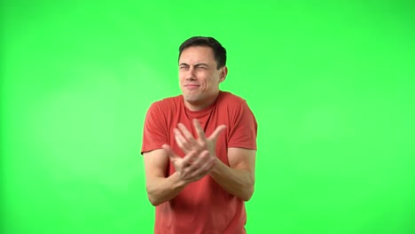 happy man demonstrating positive gestures and emotions on green screen