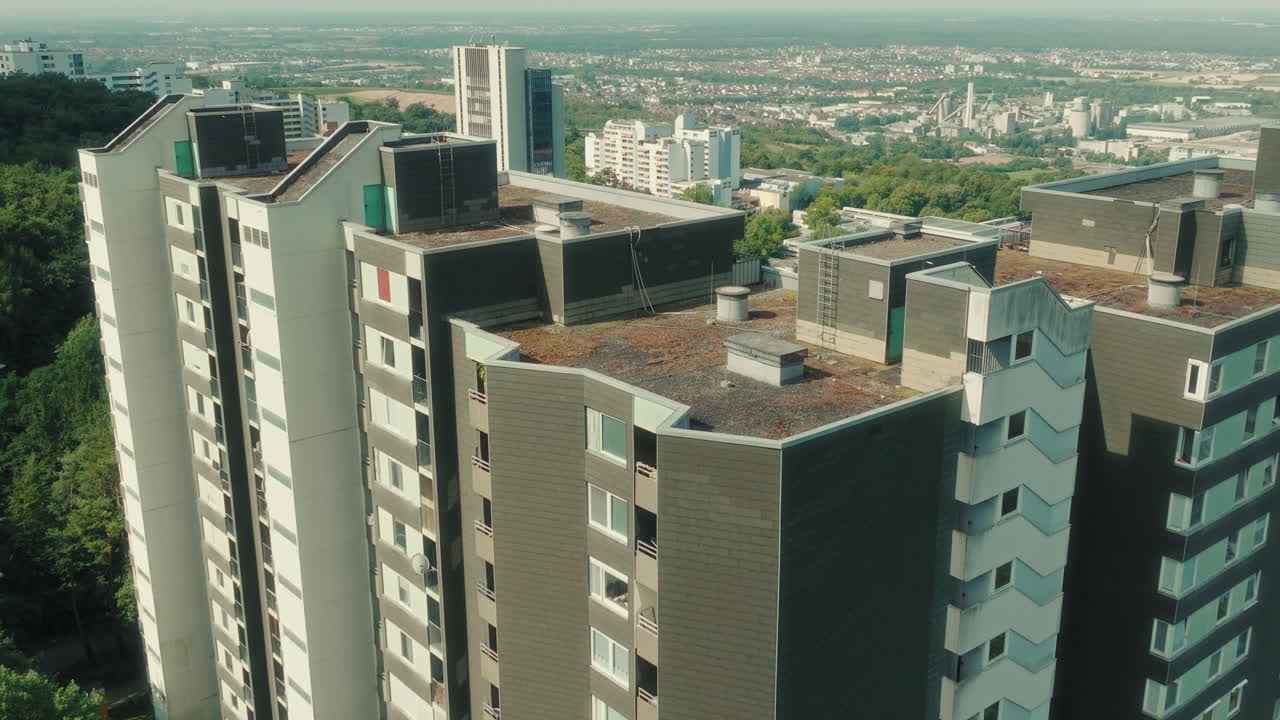 Aerial: close up of Emmertsgrund neighborhood and buildings during the day in Heidelberg, state of Baden-Wurttemberg, Germany, reveal drone shot