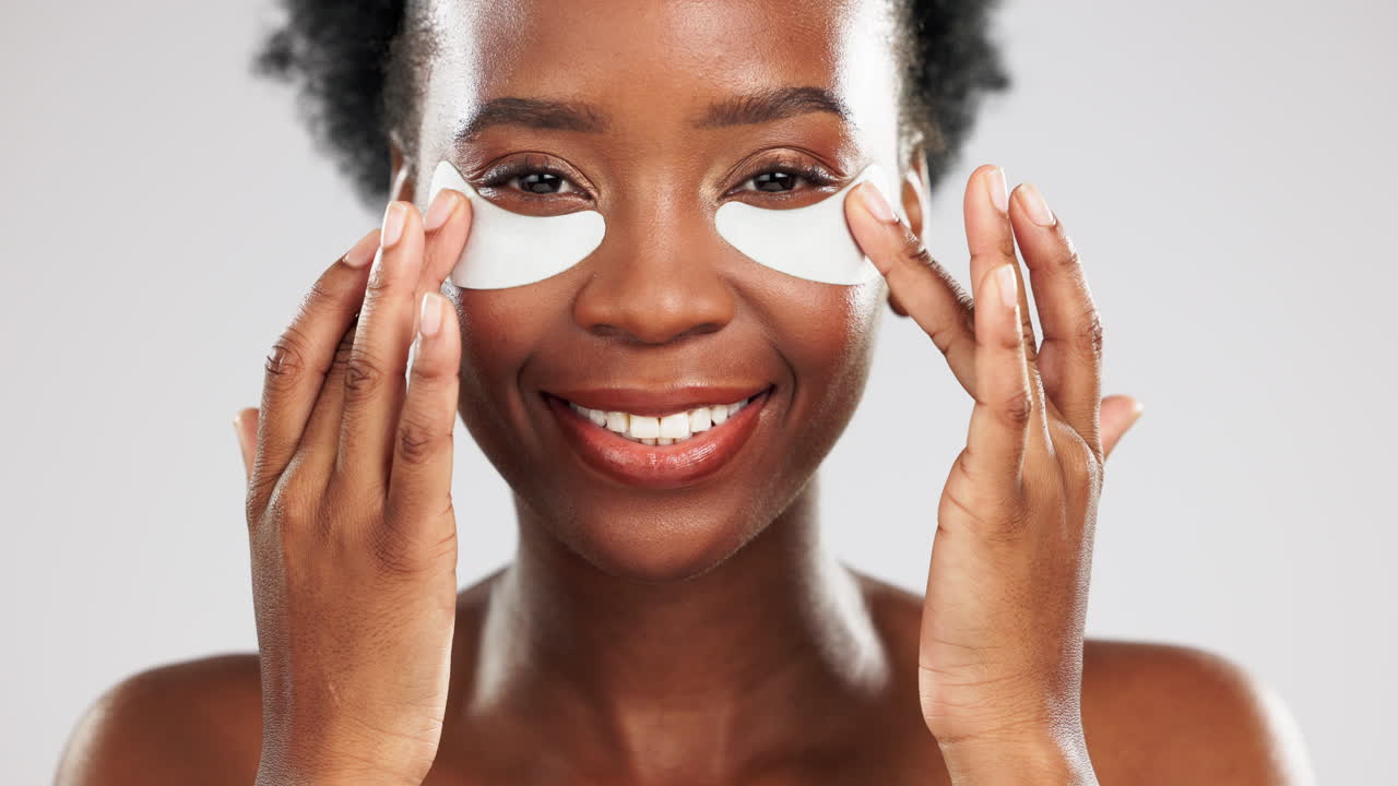 Face, skincare and happy black woman with eye mask
