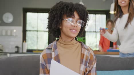 Portrait-of-diverse-teenager-girls-friends-having-video-call-at-home,-slow-motion