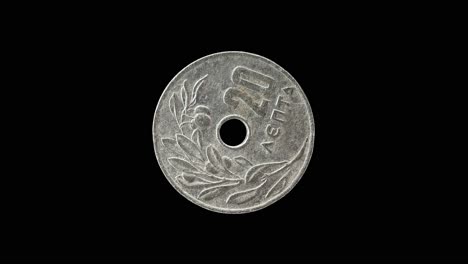 greece 1969 20 lepta coin reverse with olive branch and denomination rotating on black background