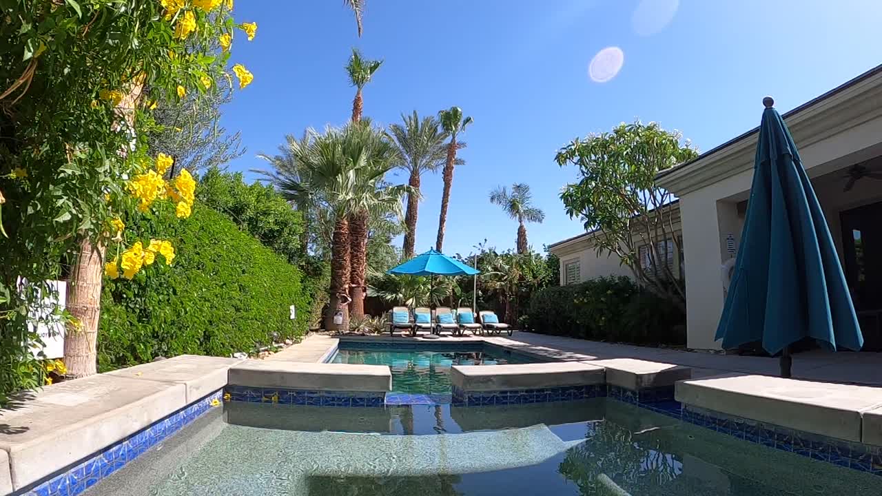 View from the hot tub with a light wind blowing, overlooking the pool ...