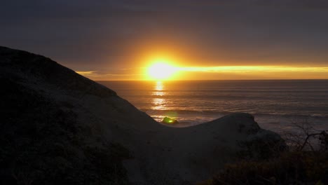 beautiful sunset by the cliffs in half moon bay, california, close to ritz carlton hotel