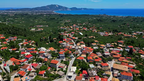 Aerial-View-Of-Community-With-Scenic-Ocean-In-Background---Drone-Shot