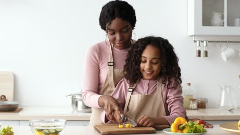 mother and daughter cooking together