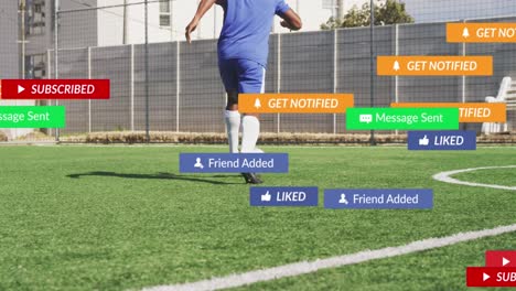 Social-media-concept-icons-against-african-american-male-soccer-player-practicing-on-sports-field