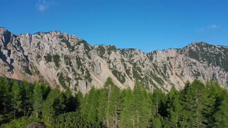 Aerial-wide-shot-of-the-peak-of-Petzen-mountain-at-Austria