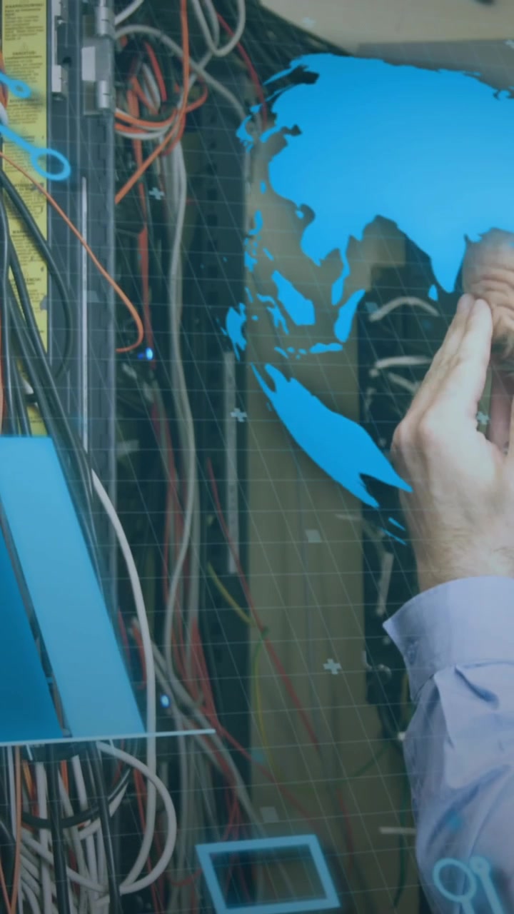 Animation of interface with data processing over caucasian male engineer working at server room