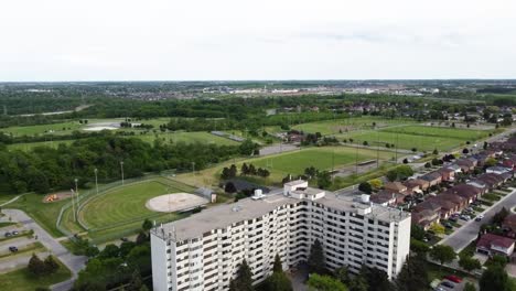 aerial shot of apartment buildings next to fields in grimsby