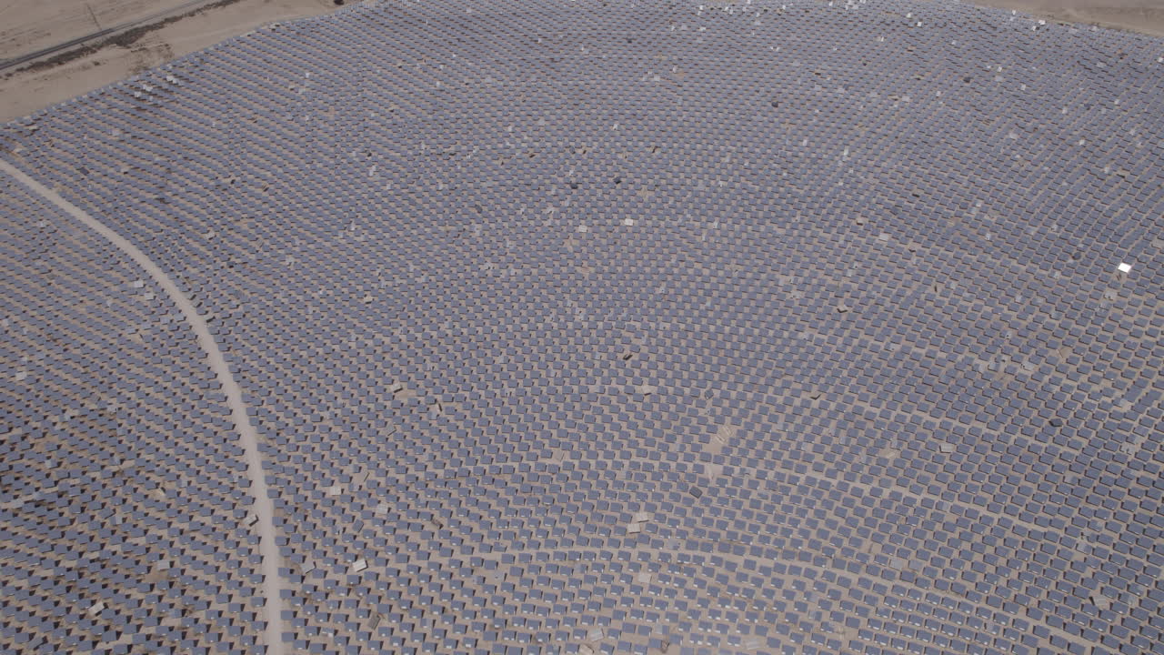 Raw file - Field of mirrors spanning an area of 260 hectares and following the sun's movement to direct the light to the top of a solar tower - Ashalim power station, Israel