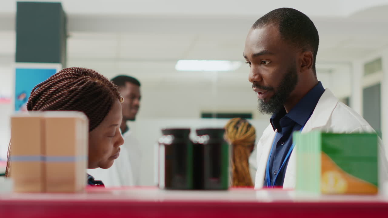 A Pharmacist Assisting a Customer in a Pharmacy