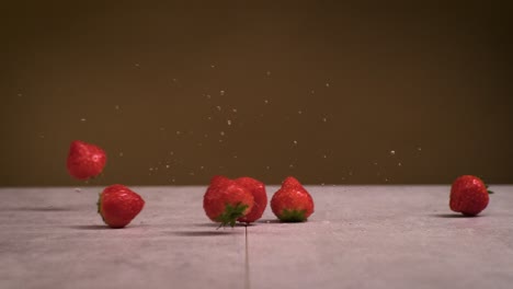 strawberry rolling in super slow motion