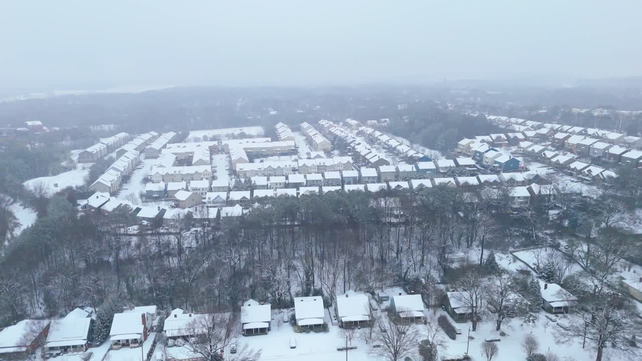 Aerial shot of snow covered homes in Atlanta, Georgia On January 10th, 2025.