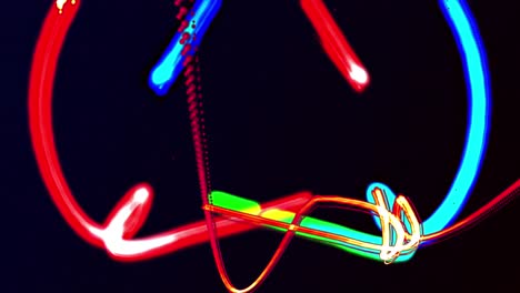 Animation-of-blue,-green-and-red-light-trails-moving-on-black-background