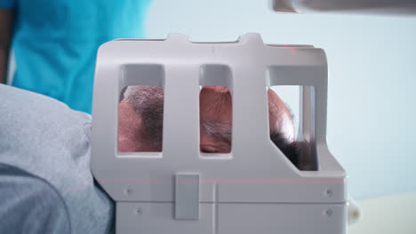 patient undergoing a head scan procedure