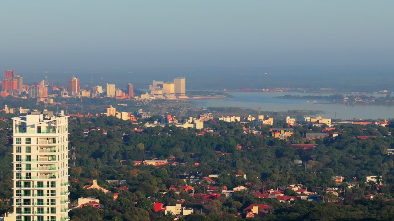 High-rise Building And Residential Buildings In Asuncion City, Paraguay. - aerial shot