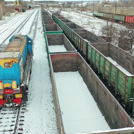 cargo trains and containers at terminal