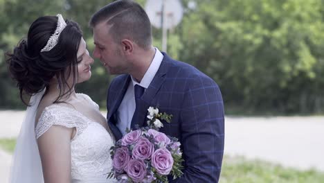 slow-motion-fantastic-young-couple-in-wedding-dressing-hugs