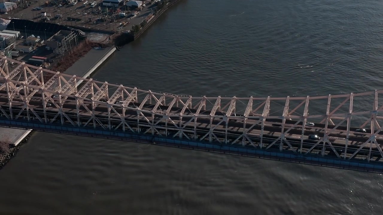 View of Queensboro Bridge in New York City from above near waterfront