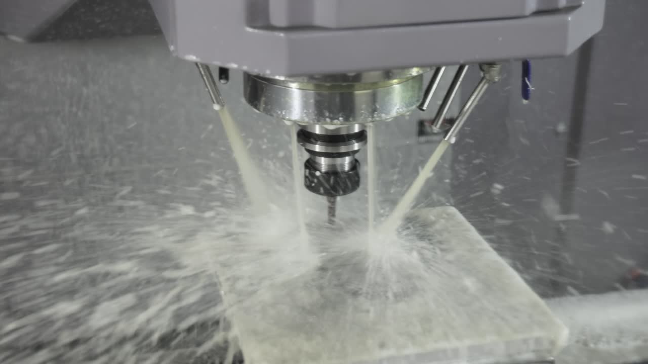 Metalworking CNC milling machine. Cutting metal modern processing technology.