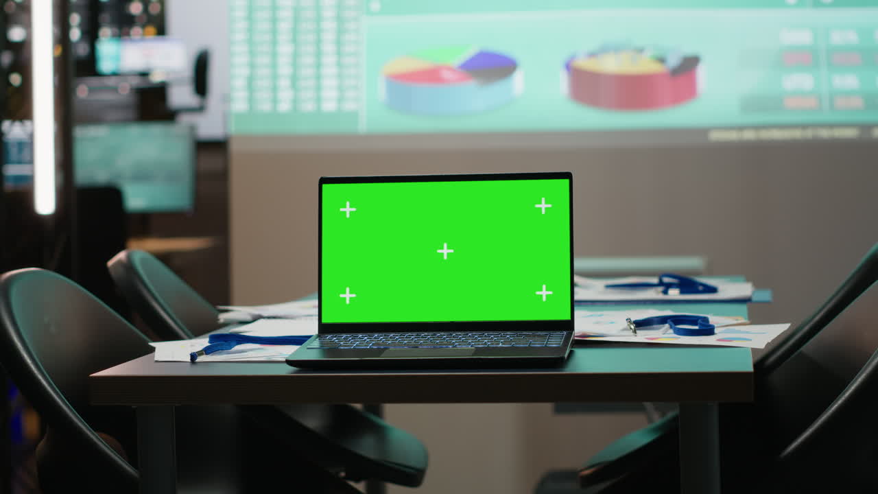 Boardroom is staged for success with green screen and forecasting visuals