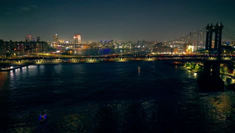 Vehicles-traverse-bridge,-lights-showcasing-dynamic-motion-against-the-night-sky