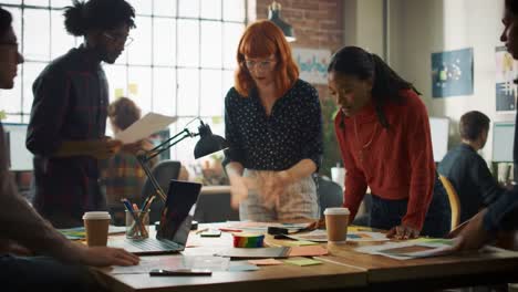 creative team collaboration: engaging discussion among colleagues in a bright, modern workspace focused on design and innovation