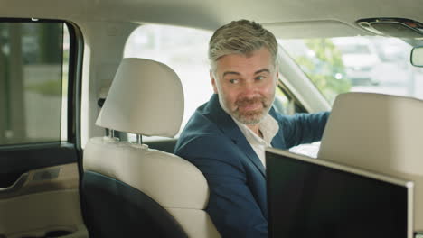 man in a car