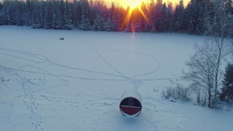 wonderful color change sky during golden hour sunset in frozen snowy forest, winter landscape