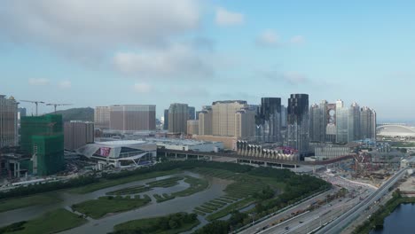 Ascending-aerial-view-of-Macau-Cotai-casino-hotel-area