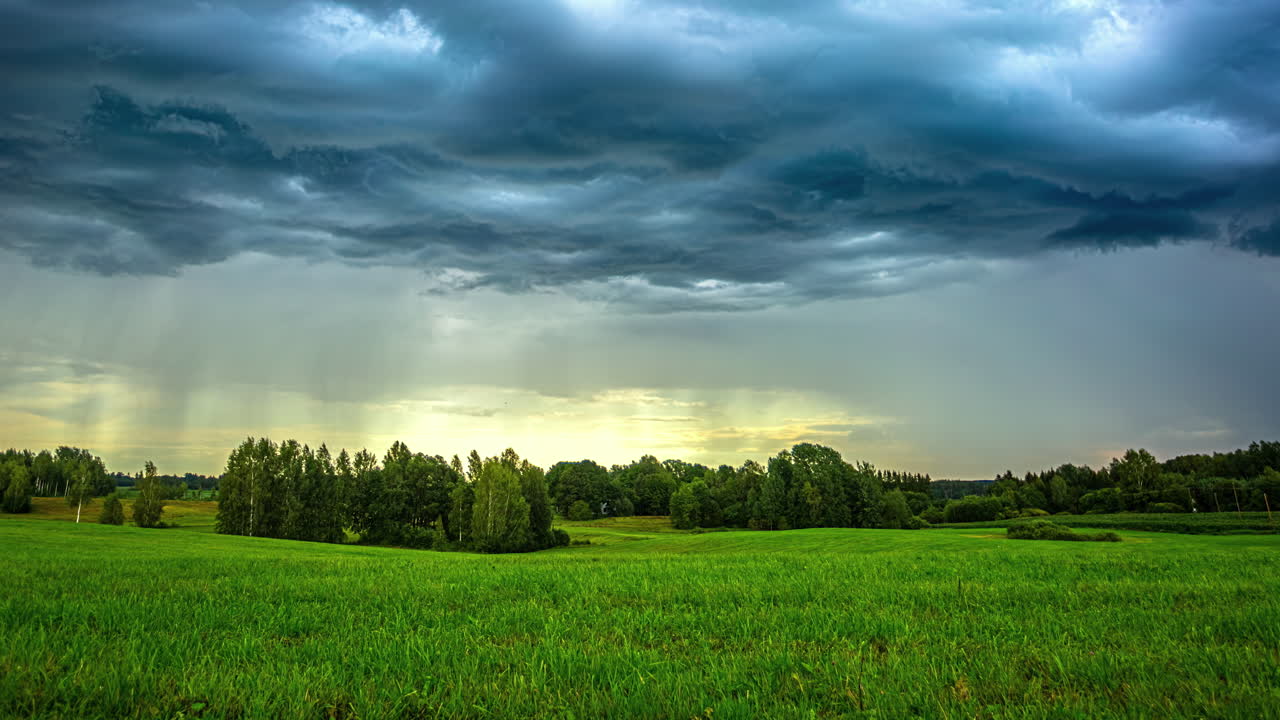 Premium stock video - Timelapse of a storm dropping rain onto peaceful ...