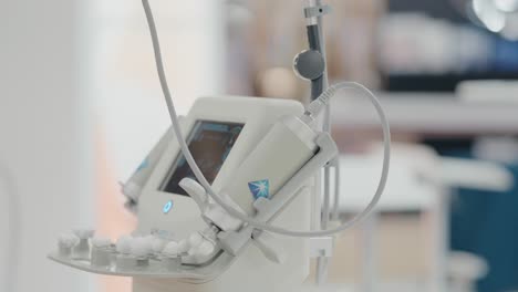 close-up of a modern laser hair removal machine with digital interface