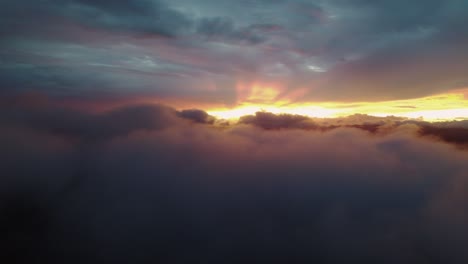 bright sunset sky on dark cloudy horizon, 4k drone costa rica