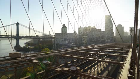 millions of pedestrians, cyclists, and commuters traverse brooklyn bridge span