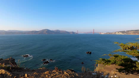 Golden-Gate-Bridge,-Slow-Steady-Zoom-In-from-Land-End-Trails-in-San-Francisco-California---4K