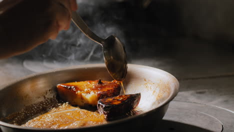 Sautéing-sweet-potatoes-in-a-sweet-brown-sauce-in-slow-motion