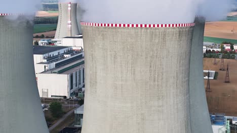 close aerial look at nuclear power plant cooling tower concrete wall