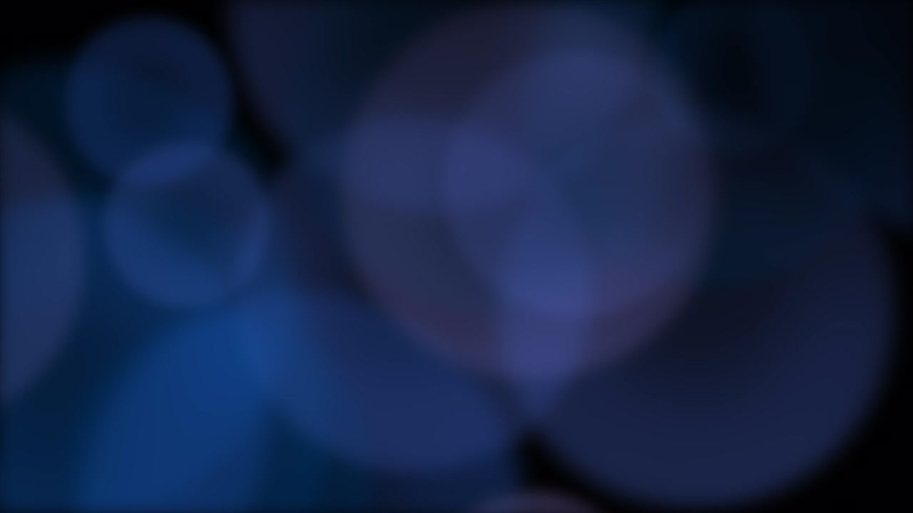 Fly big blue round bokeh on dark background | Premium Stock Video Footage