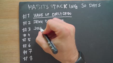 habits stacking for 30 days list on the whiteboard focus shot