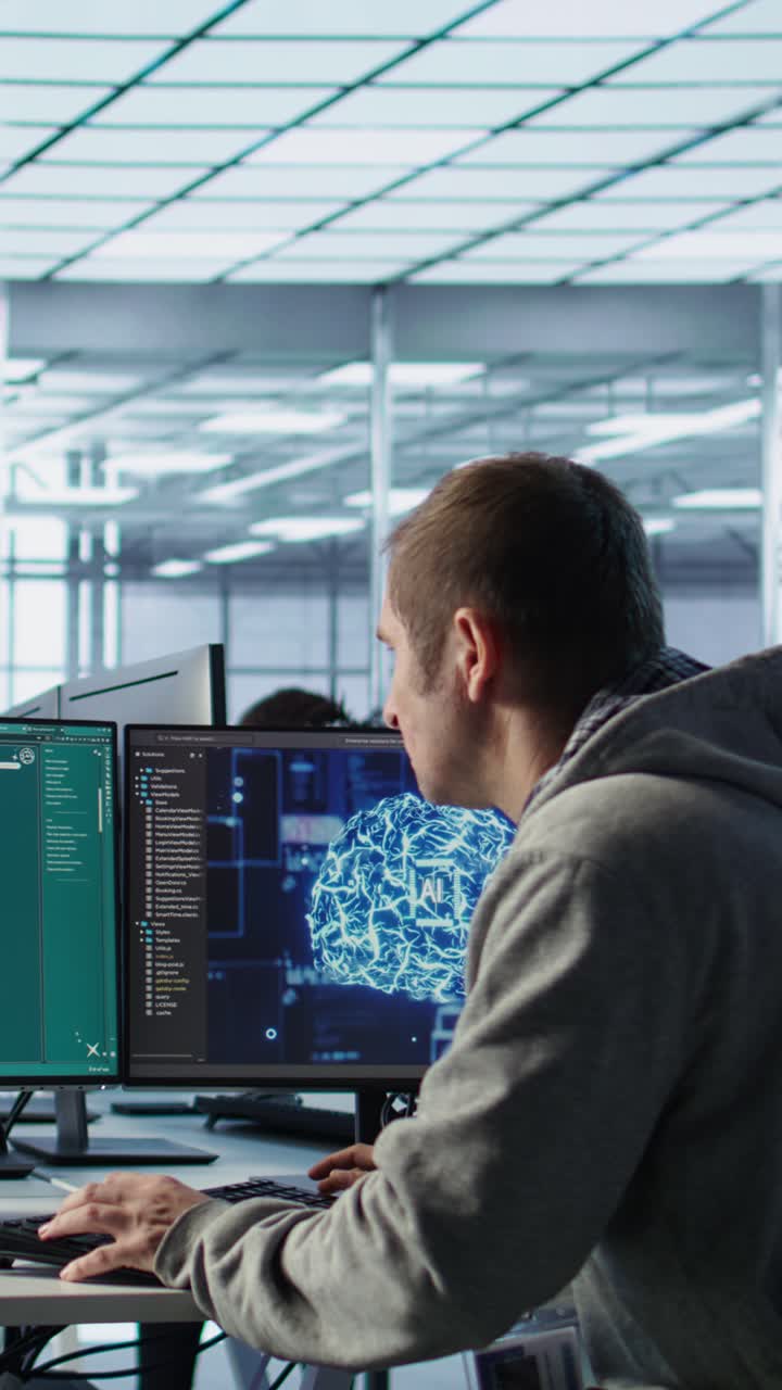 Male Developer Working on AI Software in Modern Office