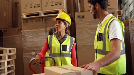 warehouse workers working together