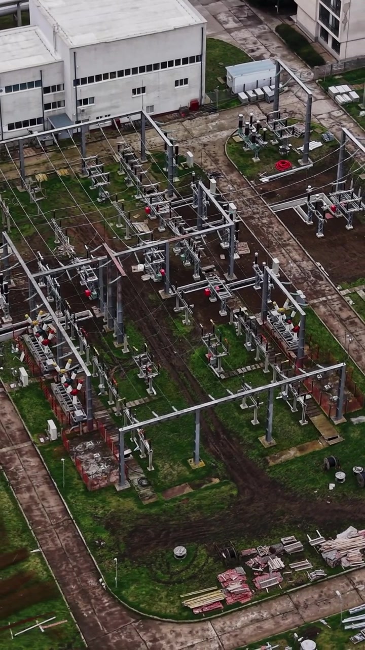 Electrical substation with equipment and structures in a green field